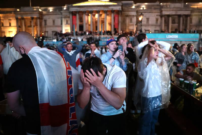 England fans react at Trafalgar Square after Italy won the Euro 2020 final.