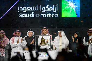 Saudi Aramco board members with Tadawul chairperson Sarah Al-Suhaimi and chief executive Khalid Al Hussan at the bell ringing ceremony marking the launch of the company's shares trading. Photo courtesy of Saudi Aramco