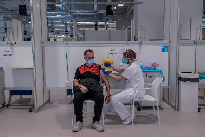 A man receives the AstraZeneca vaccine  at the Nurse Isabel Zendal Hospital in Madrid, Spain. AP Photo