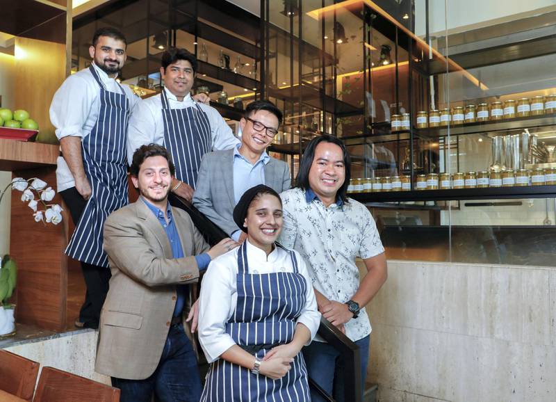 Dubai, UAE, February 19,2018.  Andre (the boss) of Baker & Spice café Al Manzil Mall Dubai  and some of his team for a feature story.  (L-R) from back row: Manish Gajara, Sumanta Roy, Adrian Chow and Deejay Leon, (front) Andre Gerschel and Aaliyah Randeree.Victor Besa / The NationalWKReporter:  Kevin Hacket