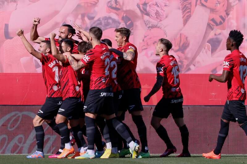 Mallorca's players celebrate after scoring. EPA