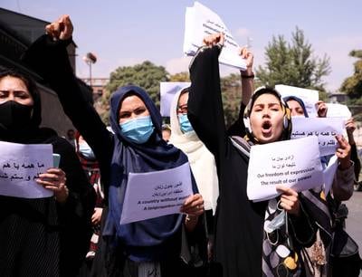Activists protest to demand equal rights for women under Taliban rule, in front of the presidential palace, in Kabul, Afghanistan. Reuters