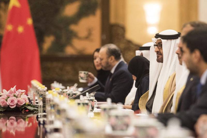 Sheikh Mohammed bin Zayed, Crown Prince of Abu Dhabi and Deputy Supreme Commander of the Armed Forces speaks to Chinese President Xi Jinping (unseen) during a signing ceremony at the Great Hall of the People in Beijing, China. Fred Dufour / EPA / Pool Pool