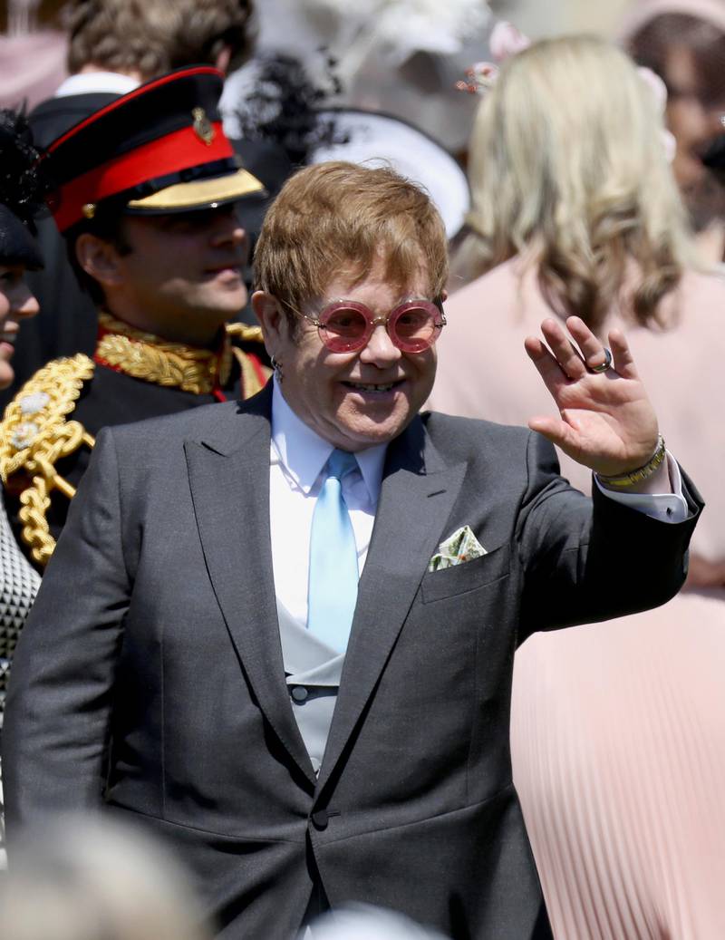 Elton John arrives for the wedding of Prince Harry to Meghan Markle, at St. George's Chapel in Windsor Castle in Windsor, near London, England, Saturday, May 19, 2018. (Chris Jackson/pool photo via AP)