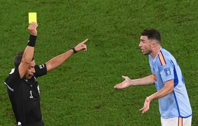 Aymeric Laporte of Spain is booked. EPA 