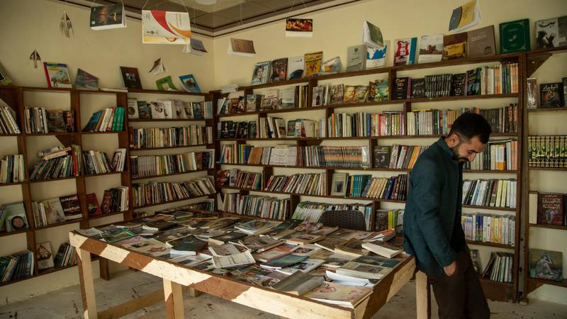Kamiran Kamal Khalaf standing inside his newly opened bookstore in the city of Sinjar north of Iraq. Haider Husseini for The National