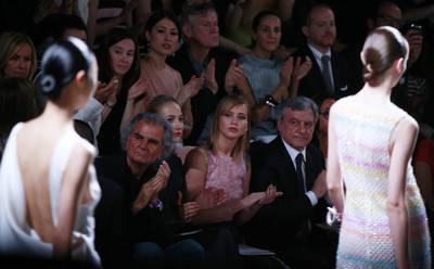Patrick Demarchelier sits front row at the Dior show in Paris on July 1, 2013. Reuters