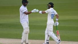 India's Pujara and Pakistan's Rizwan bat together for Sussex - in pictures