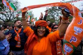 Supporters of India's ruling Bharatiya Janata Party celebrate victory in the Rajasthan state election in Jaipur, India, on Sunday. AP