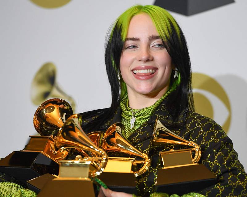 Billie Eilish with her 2020 Grammy Awards for Album of the Year, Record of the Year, Best New Artist, Song of the Year and Best Pop Vocal Album. AFP