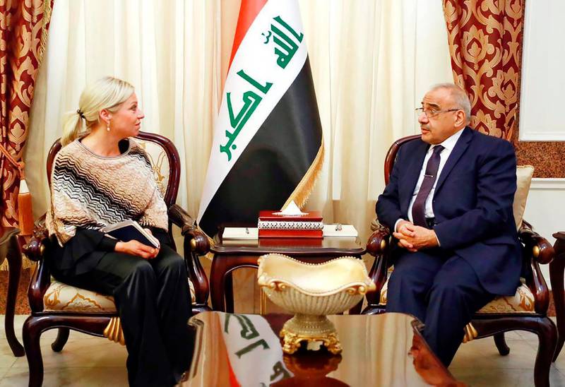 A photo released by the Iraqi Prime Minister Media Office, shows Iraqi acting Prime Minister Adil Abdul-Mahdi meeting with the U.N. special representative to Iraq Jeanine Hennis-Plasschaert at the prime minister's office, in Baghdad, Iraq, Monday, Jan. 6, 2020. (Iraqi Prime Minister Media Office, via AP)