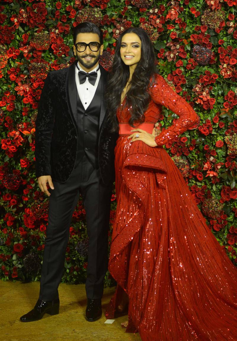 MUMBAI, MAHARASHTRA-DECEMBER 01: Ranveer Singh and Deepika Padukone pose for photographs before their reception in Mumbai. (Photo by Milind Shelte/India Today Group/Getty Images)