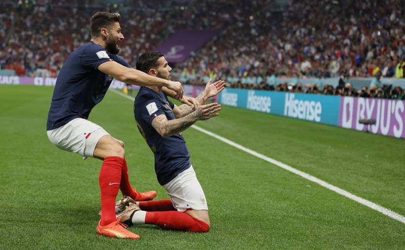 France's Theo Hernandez  (R) celebrates scoring the first goal with Olivier Giroud. EPA