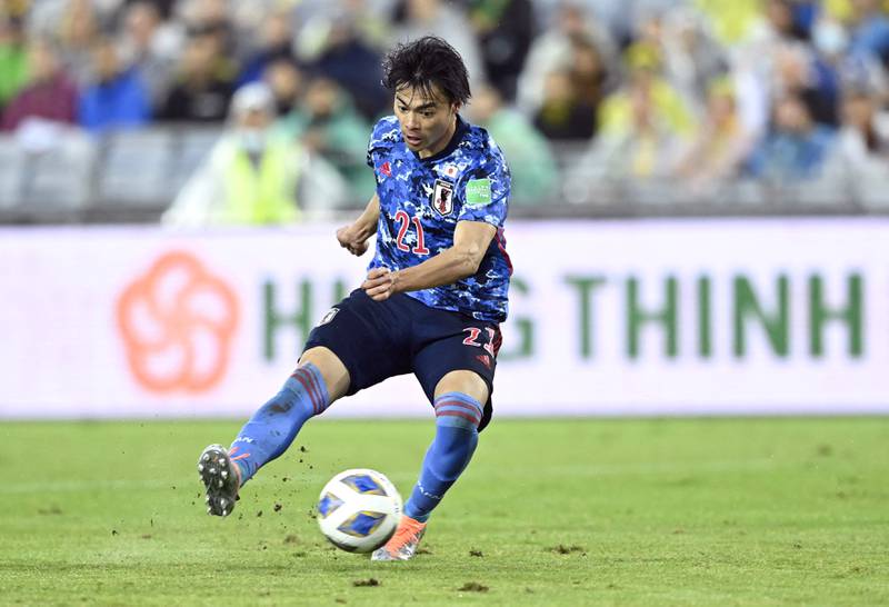 Japan's Kaoru Mitoma scores their second goal. Reuters