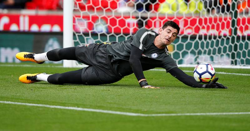 Soccer Football - Premier League - Stoke City vs Chelsea - bet365 Stadium, Stoke-On-Trent, Britain - September 23, 2017   Chelsea's Thibaut Courtois warms up before the match   REUTERS/Andrew Yates    EDITORIAL USE ONLY. No use with unauthorized audio, video, data, fixture lists, club/league logos or "live" services. Online in-match use limited to 75 images, no video emulation. No use in betting, games or single club/league/player publications. Please contact your account representative for further details.