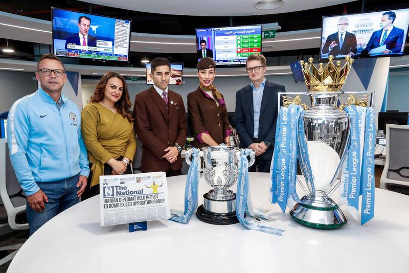 Abu Dhabi, U.A.E., July 3, 2018. The Premier League trophy visits the National offices by former Manchester City striker Paul Dickov.Victor Besa / The National
