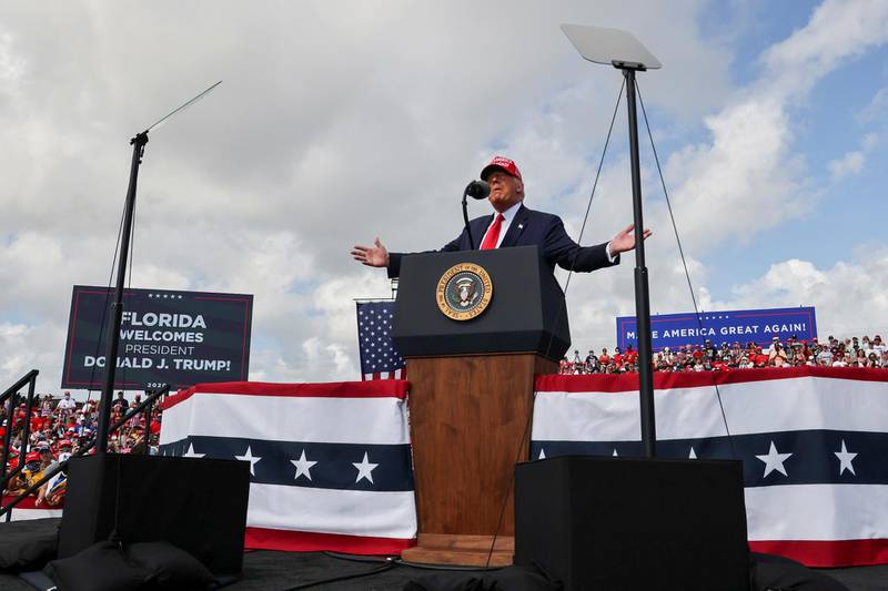 US President Donald Trump speaks during a campaign rally outside Raymond James Stadium, in Tampa, Florida. Reuters