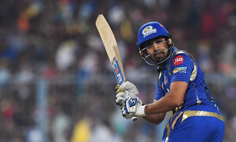 Mumbai Indians captain Rohit Sharma watches the ball after playing a shot during the 2017 Indian Premier League (IPL) Twenty20 cricket match between Kolkata Knight Riders and Mumbai Indians at The Eden Gardens Cricket Stadium in Kolkata on May 13, 2017. ----IMAGE RESTRICTED TO EDITORIAL USE - STRICTLY NO COMMERCIAL USE----- / GETTYOUT------ / AFP PHOTO / Dibyangshu SARKAR / ----IMAGE RESTRICTED TO EDITORIAL USE - STRICTLY NO COMMERCIAL USE----- / GETTYOUT