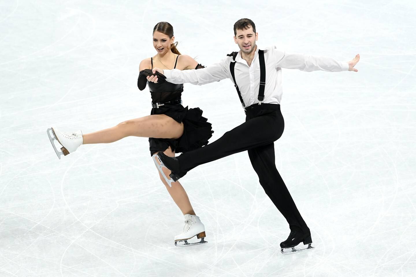Oleksandra Nazarova and Maksym Nikitin of Team Ukraine skate in the Ice Dance - Rhythm Dance - Team Event at the Beijing 2022 Winter Olympic Games. Getty Images