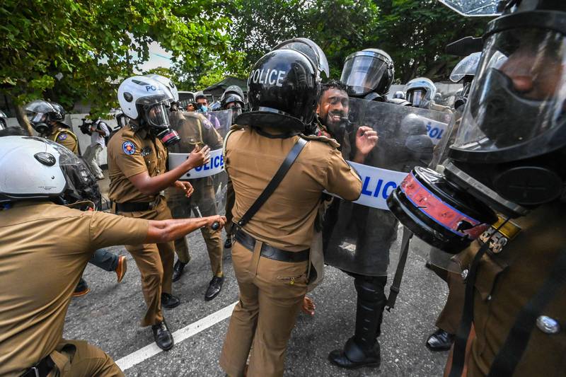 Students clash with police. AFP