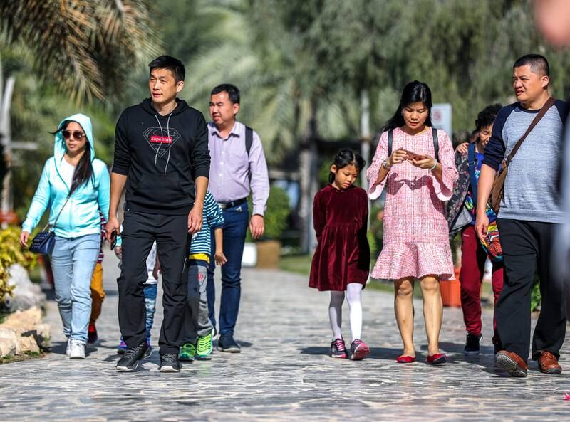 Abu Dhabi, U.A.E., February 10, 2018.  Chinese tourists enjoying the Abu Dhabi sights at the UAE Heritage Village.Victor Besa / The NationalNationalRequested By:  Olive Obina