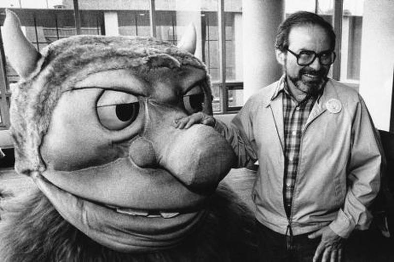 FILE - In this Sept. 25, 1985 file photo, author Maurice Sendak poses with one of the characters from his book "Where the Wild Things Are," designed for the operatic adaptation of his book in St. Paul, Minn. Sendak died, Tuesday, May 8, 2012 at Danbury Hospital in Danbury, Conn. He was 83. (AP Photo, file) *** Local Caption ***  Obit Maurice Sendak.JPEG-023c6.jpg