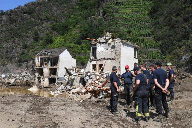 Emergency crews stand by in Mayschoss, Rhineland-Palatinate, Germany, after devastating floods. AFP