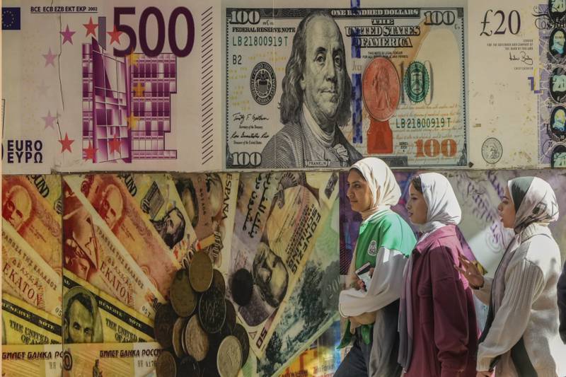 Egypt continues to battle surging inflation amid a slide of its currency. AP 