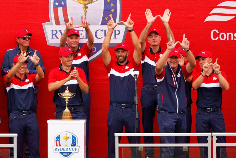 The United States team celebrate with the Ryder Cup after beating Europe 19-9 at Whistling Straits in Wisconsin on Sunday. Reuters