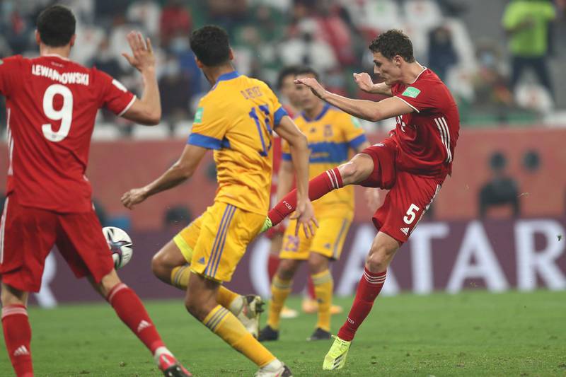 Bayern's Benjamin Pavard, right, scores his side's opening goal during the Club World Cup final soccer match between FC Bayern Munich and Tigres at the Education City stadium in Al Rayyan, Qatar, Thursday, Feb. 11, 2021. (AP Photo)