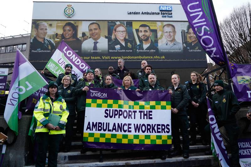 Ambulance workers gather at a picket line in Waterloo, London. AFP
