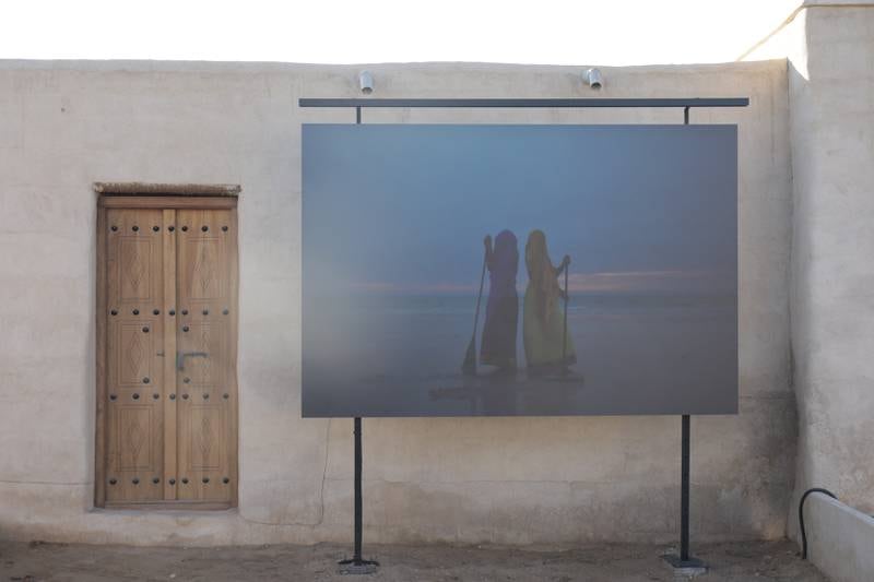 A piece on display at  Al Jazirah Al Hamra Heritage Village, where a labyrinth of outdoor exhibition passageways will show work from local and international artists until March 31.