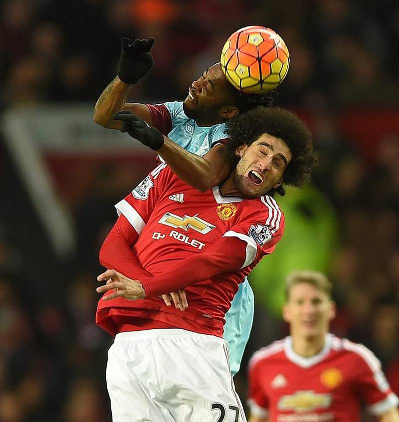 West Ham United’s Alexandre Song (R) in action with Manchester United’s Marouane Fellaini (L) during the English Premier League soccer match between Manchester United and West Ham United at Old Trafford, Manchester, Britain, 05 December 2015.  EPA/PETER POWELL