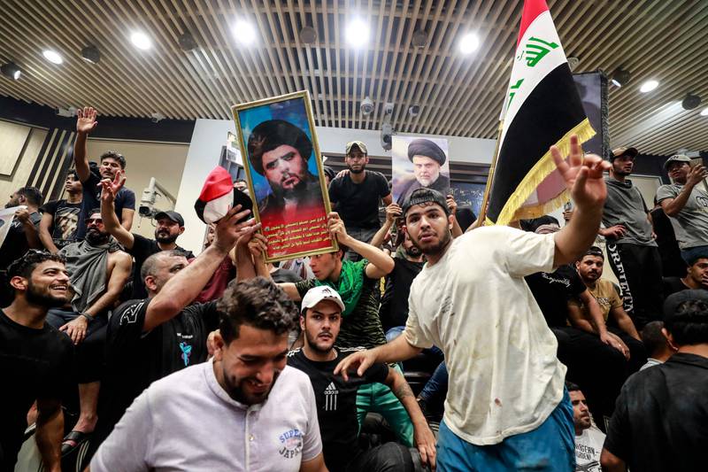 Supporters of Mr Al Sadr on Saturday entered Iraq's parliament, after hundreds breached the building on  Wednesday in similar protests.  AFP