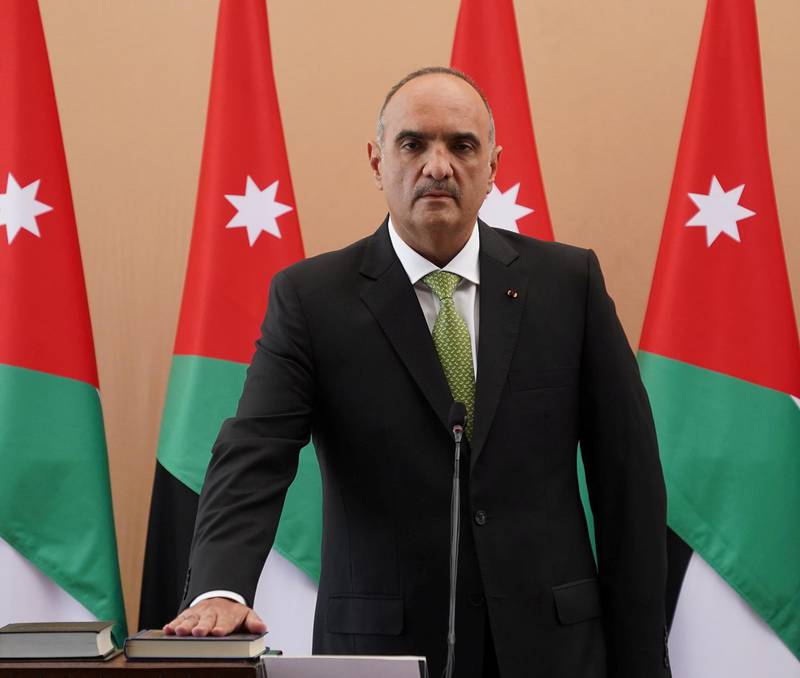 Jordan's newly-appointed Prime Minister Bisher al Khasawneh takes oath during a swearing-in ceremony of the new government in Amman, Jordan October 12, 2020. Jordanian Royal Palace/Handout via Reuters ATTENTION EDITORS - THIS IMAGE HAS BEEN SUPPLIED BY A THIRD PARTY. NO RESALES. NO ARCHIVES