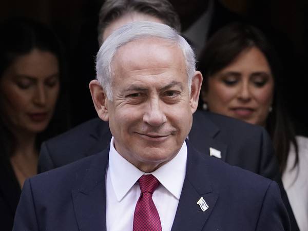 Israeli Prime Minister Benjamin Netanyahu delayed plans to reform his country's judiciary after protesters took to the streets. AP