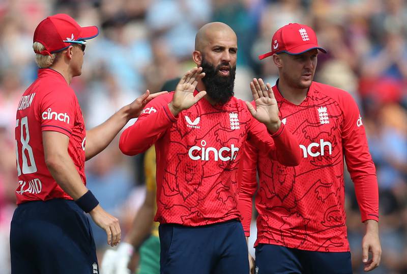 England's Moeen Ali celebrates with teammates Sam Curran, left, and Jason Roy after his dismissal of South Africa's Rilee Rossouw. AFP