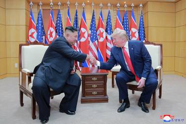 US President Donald Trump and North Korean leader Kim Jong Un at the demilitarised zone, in Panmunjom, South Korea, June 30, 2019. KCNA 