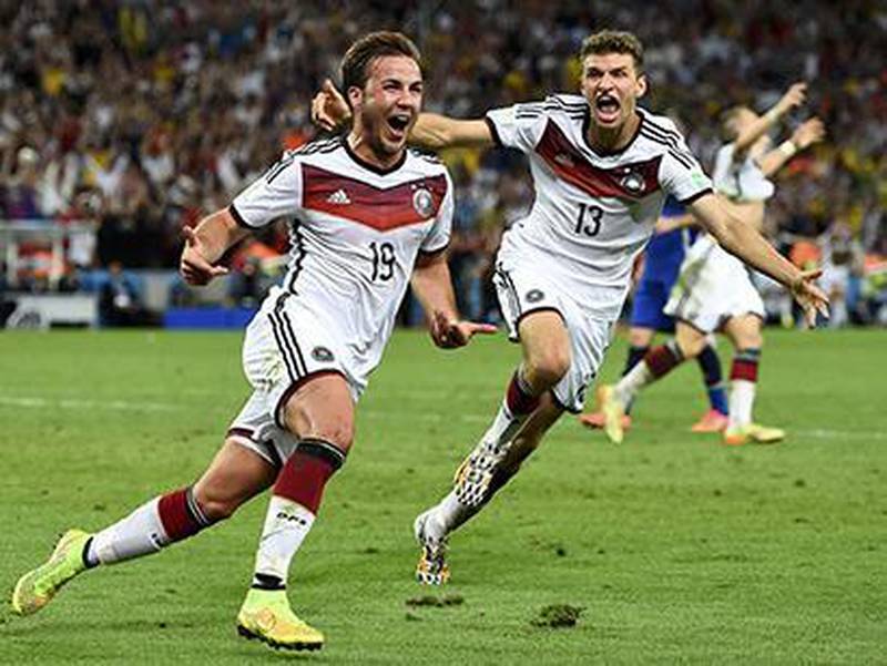 Germany's Mario Gotze, left, celebrates near teammate Thomas Mueller after scoring a goal during extra time in their 2014 World Cup final against Argentina at the Maracana. Dylan Martinez / Reuters