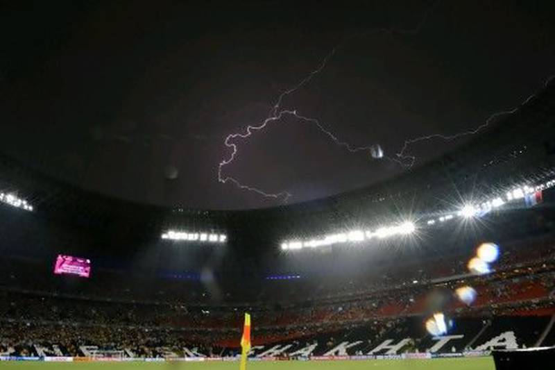 The Ukraine v France match was suspended due to heavy rainfall and lighting overhead. Franck Fife / AFP
