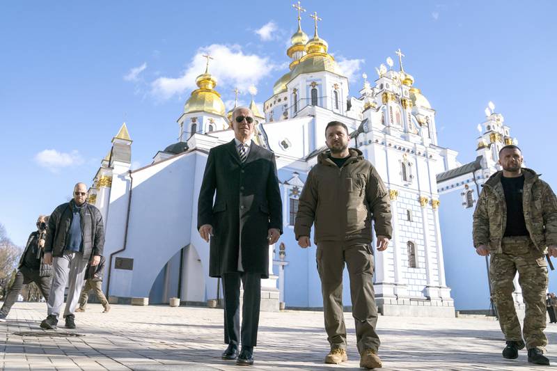 US President Joe Biden walks with Ukrainian President Volodymyr Zelenskyy at St Michael's Golden-Domed Monastery on a surprise visit to Kyiv. AP