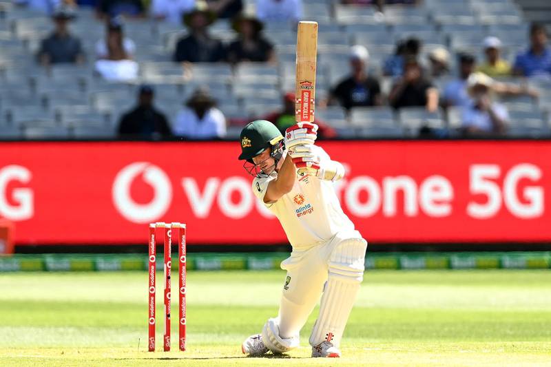 MELBOURNE, AUSTRALIA - DECEMBER 26: Joe Burns of Australia swings at a ball during day one of the Second Test match between Australia and India at Melbourne Cricket Ground on December 26, 2020 in Melbourne, Australia. (Photo by Quinn Rooney/Getty Images)
