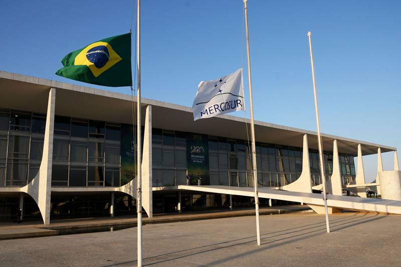 The Brazilian and the MERCOSUR flags fly at half-mast at the Planalto Palace after the death of Britain's Queen Elizabeth II, in Brasilia, on September 8, 2022. AFP