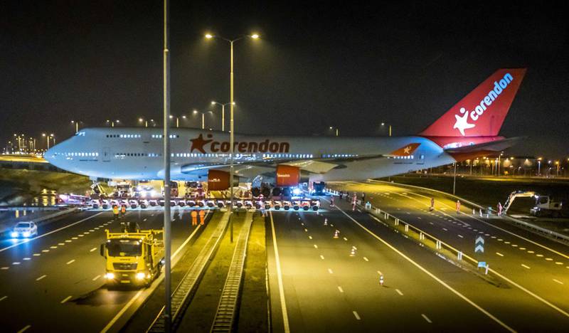 epa07355824 A fully stripped Boeing 747 of the airline Corendon is transported over the A9 highway, Badhoevedorp. the Netherlands, 09 February 2019. The jumbo jet is transported on a trailer from the airport to a hotel where it will become a hotel attraction.  EPA/LEX VAN LIESHOUT