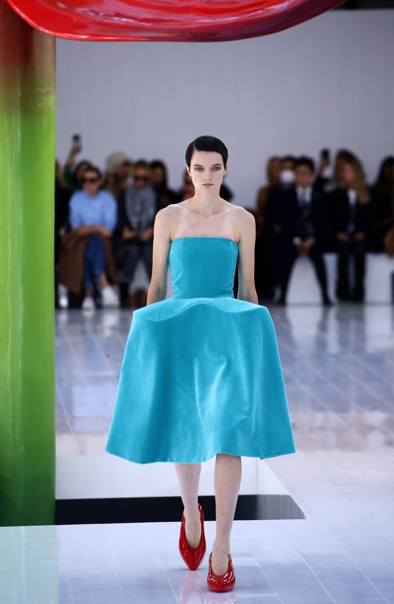 Velvet dresses arrived in strange shapes, like a suit jacket had been sewn on to the front, at Loewe spring/summer 2023. Getty