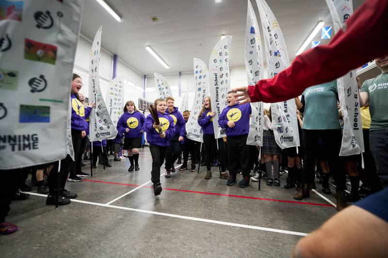 Children at Sunnyside Primary School in Craigend, Glasgow, were on hand to ensure the baton left smoothly on Friday as three pupils read out a message that was then placed inside the baton. Press Association