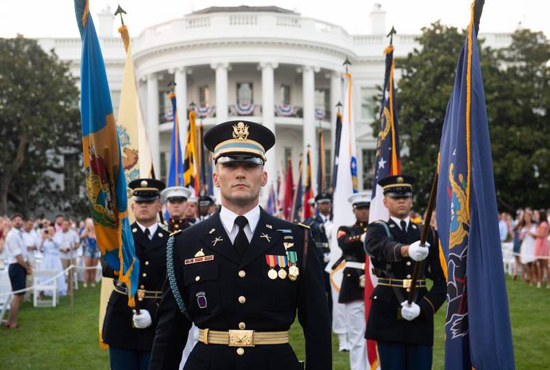 Service members stand on the South Lawn of the White House during the 2020 "Salute to America" event in honour of Independence Day in Washington, DC, July 4. Saul Loeb/ AFP