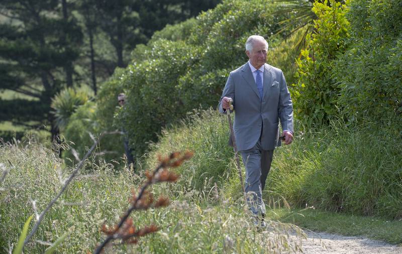 Prince Charles, a long-time environmentalist, takes part in a coastal walk in New Zealand. Getty Images