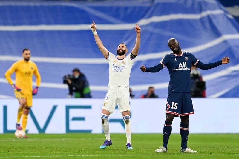 Karim Benzema celebrates after scoring his and Real's second goal. Getty