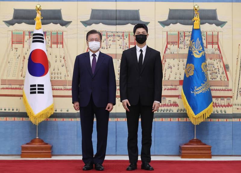 South Korean President Moon Jae-in with RM, leader of BTS. EPA